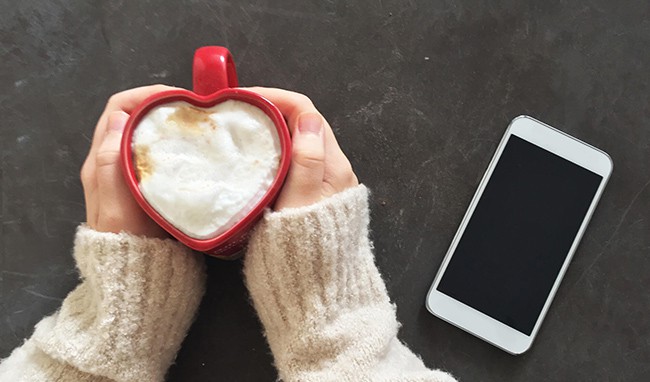 woman holding coffee mug